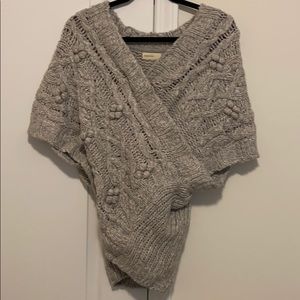Knit sweater.